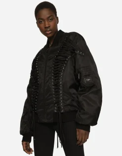 Technical fabric bomber jacket with laces and eyelets