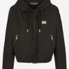 Technical fabric windbreaker with hood