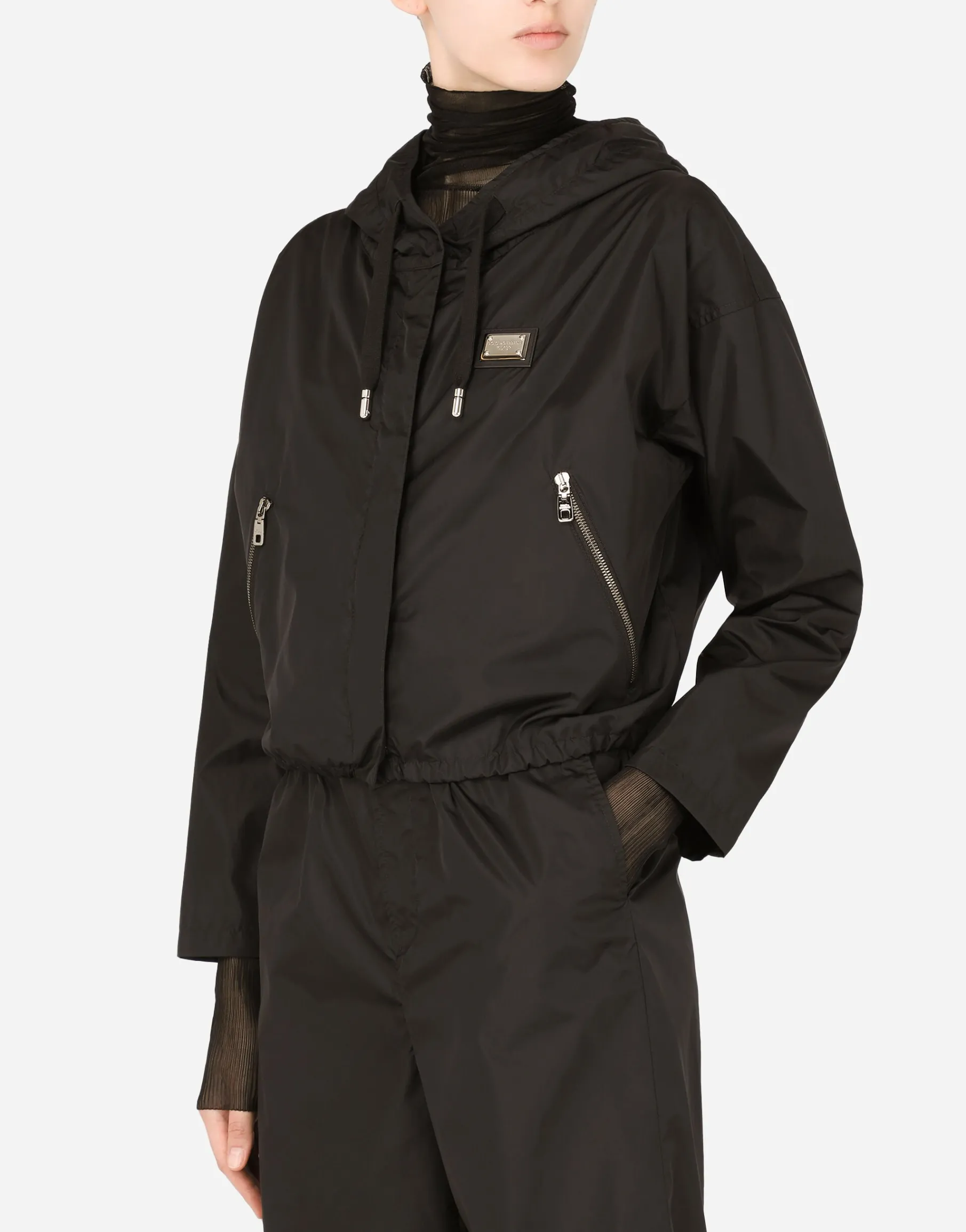 Technical fabric windbreaker with hood