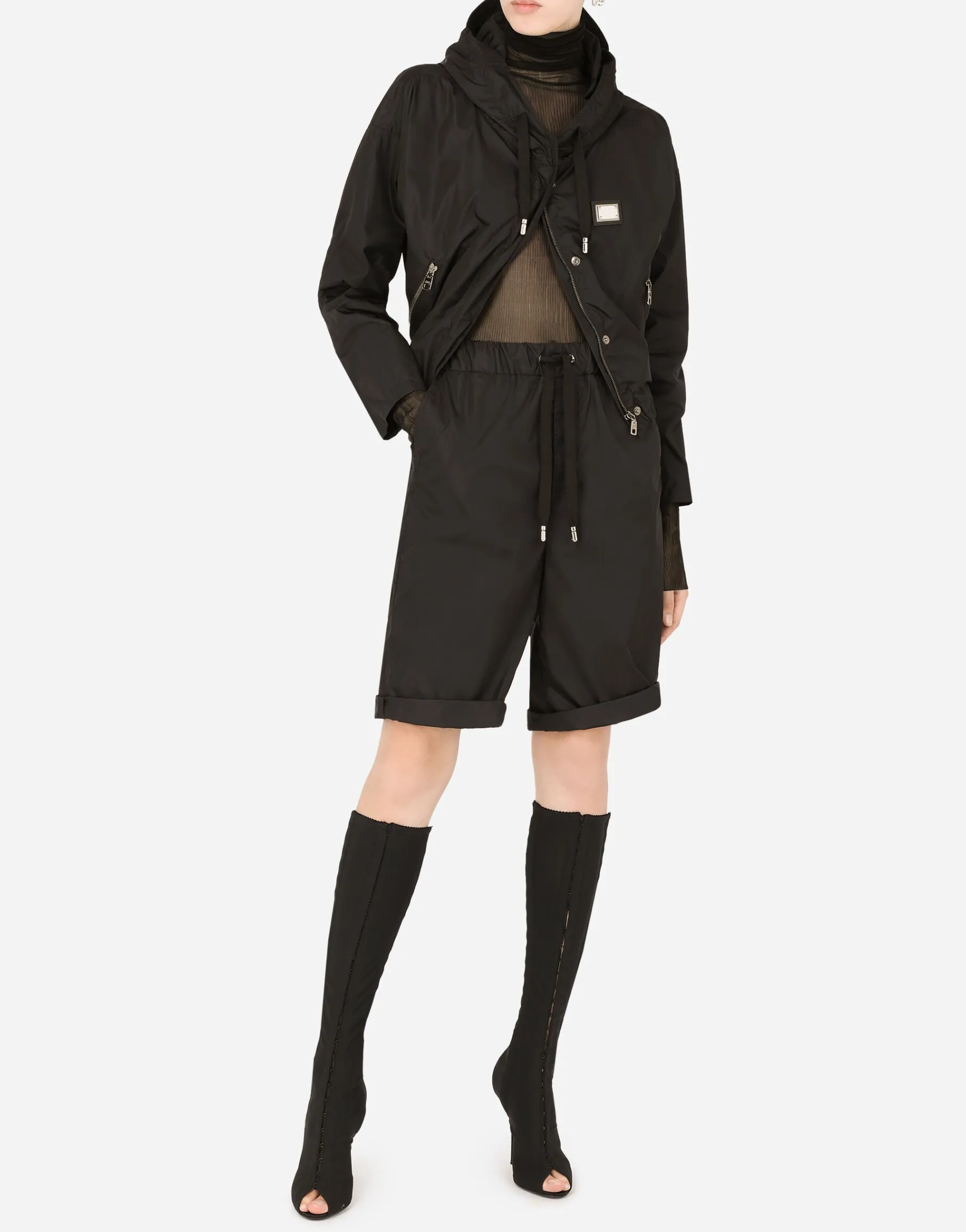 Technical fabric windbreaker with hood