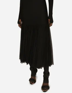 Technical jersey dress with tulle ruffle