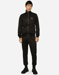 Technical jersey jogging pants with tag
