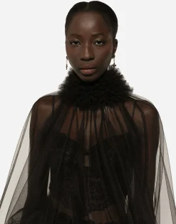Tulle blouse with ruffles on the neck and cuffs