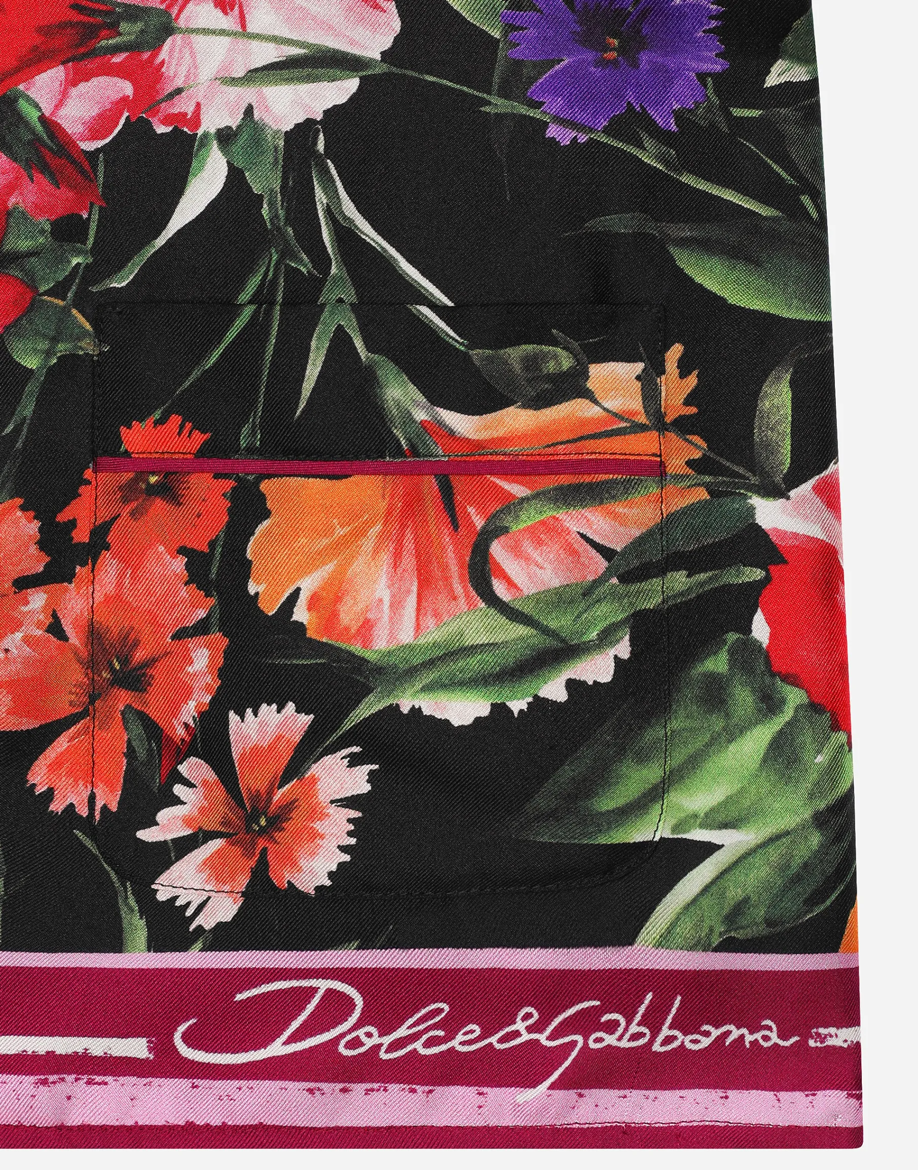 Twill shirt with floral print over a black background