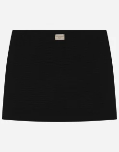 Viscose miniskirt with logo tag