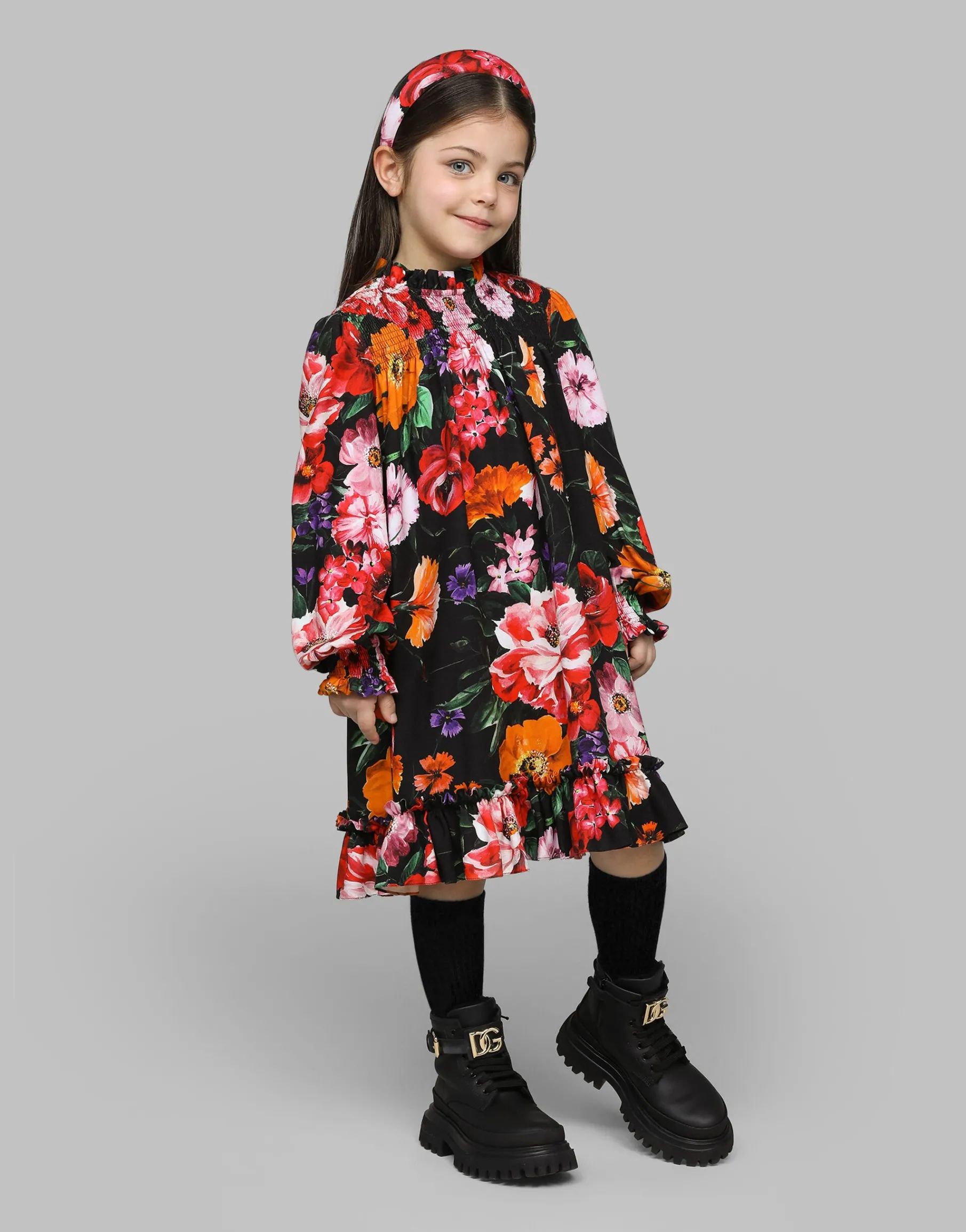 Viyella hairband with floral print over a black background
