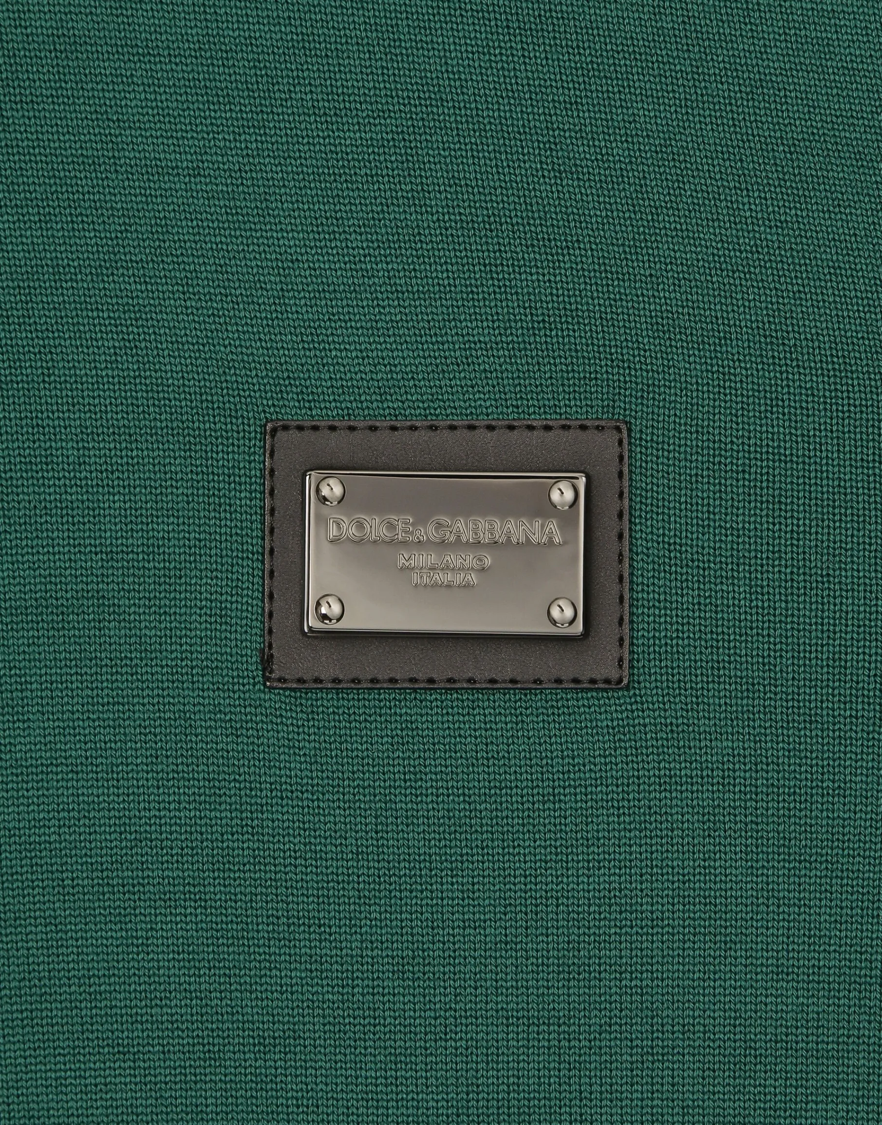 Wool polo-shirt with branded tag