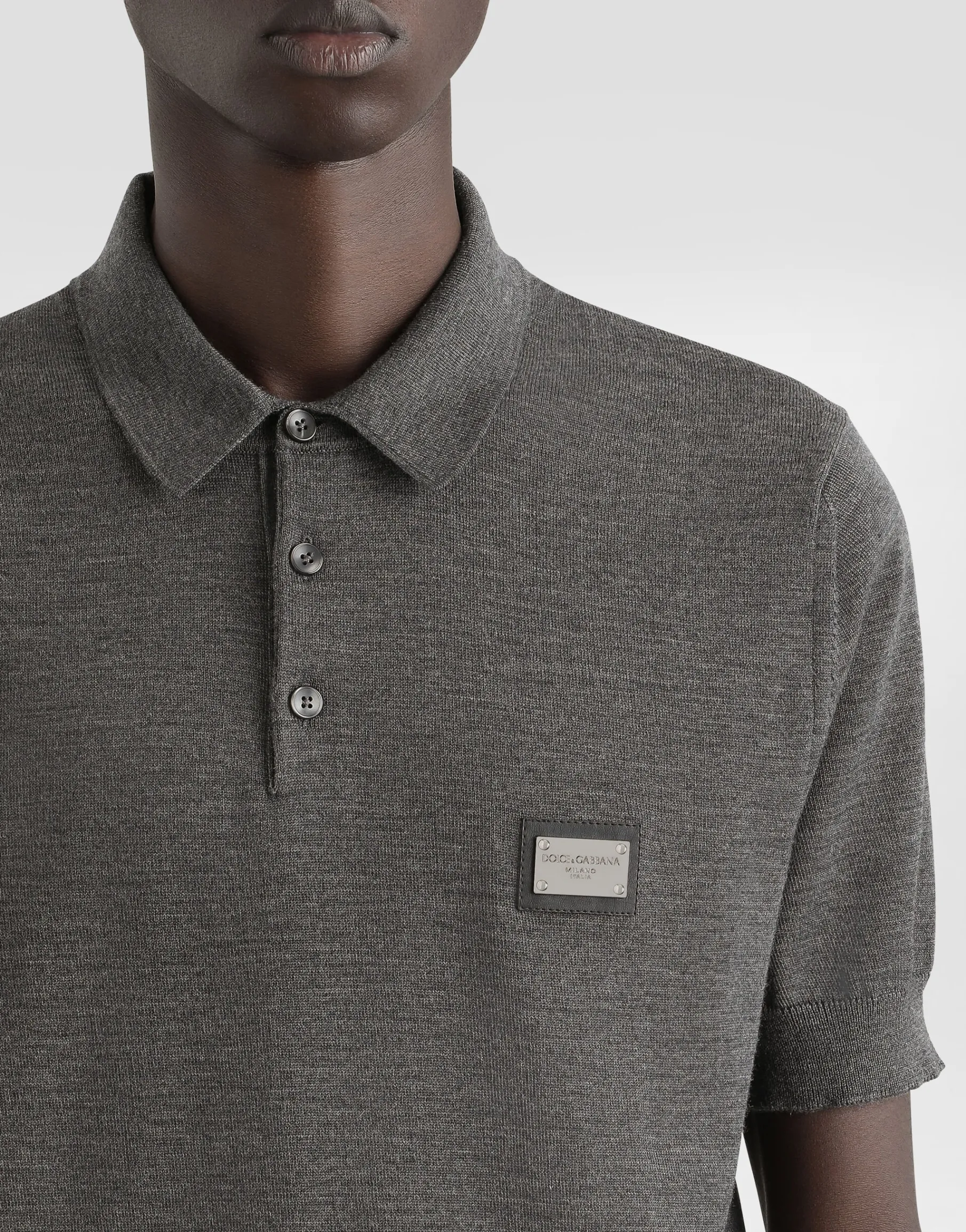 Wool polo-shirt with branded tag