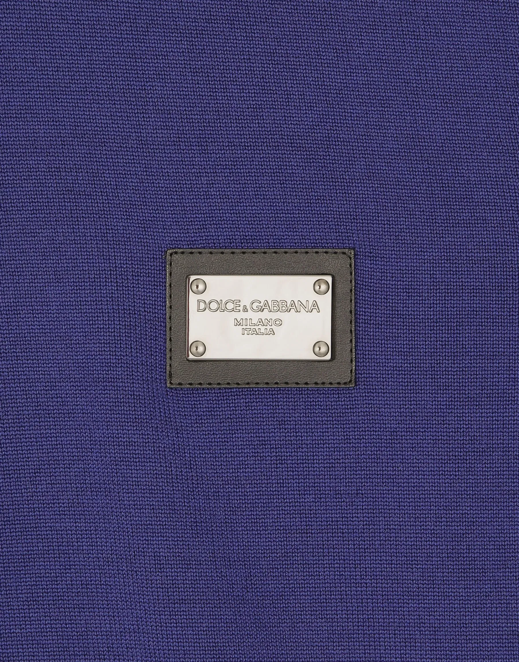 Wool polo-shirt with branded tag