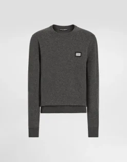 Wool round-neck sweater with branded tag