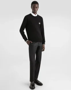 Wool round-neck sweater with branded tag