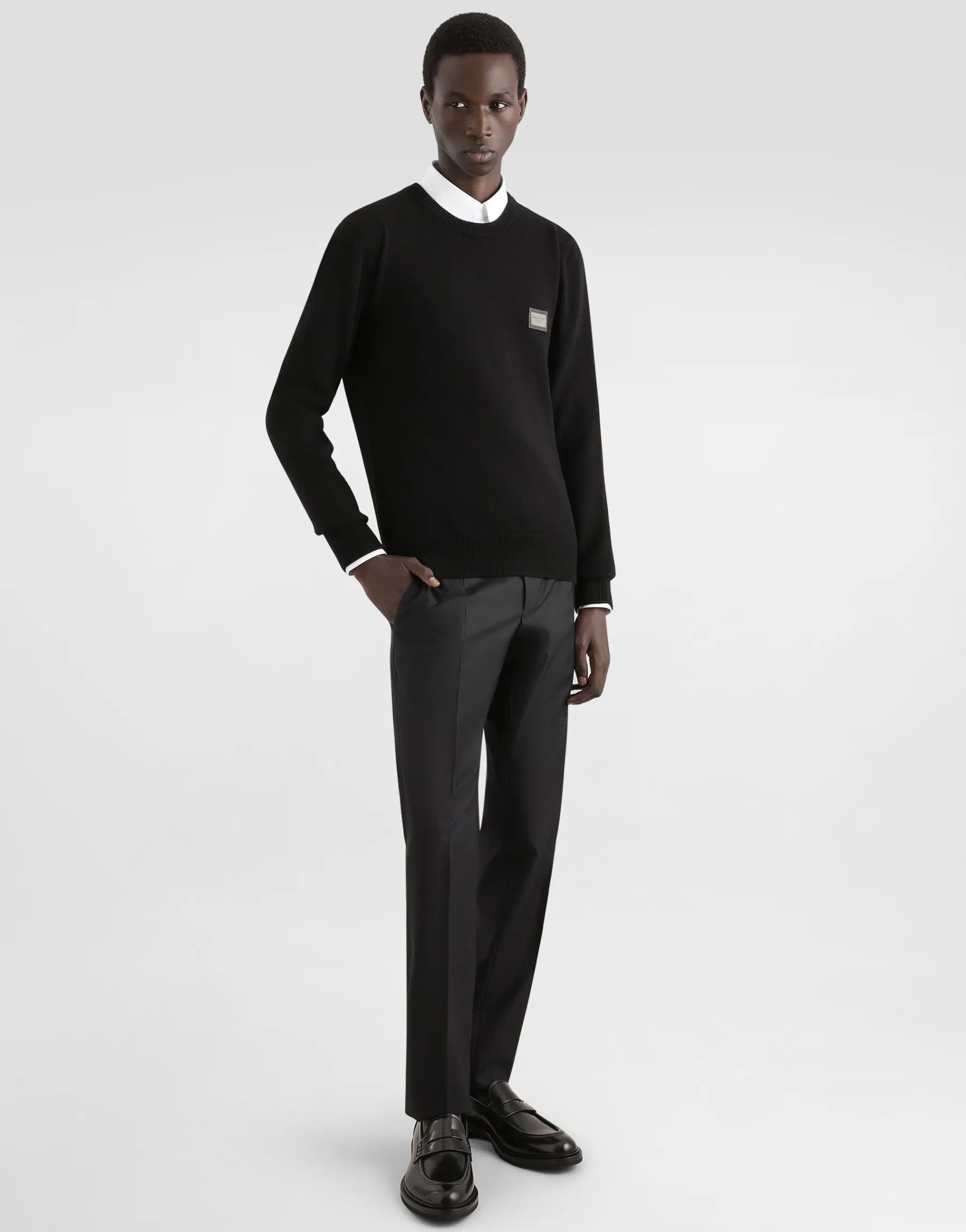 Wool round-neck sweater with branded tag