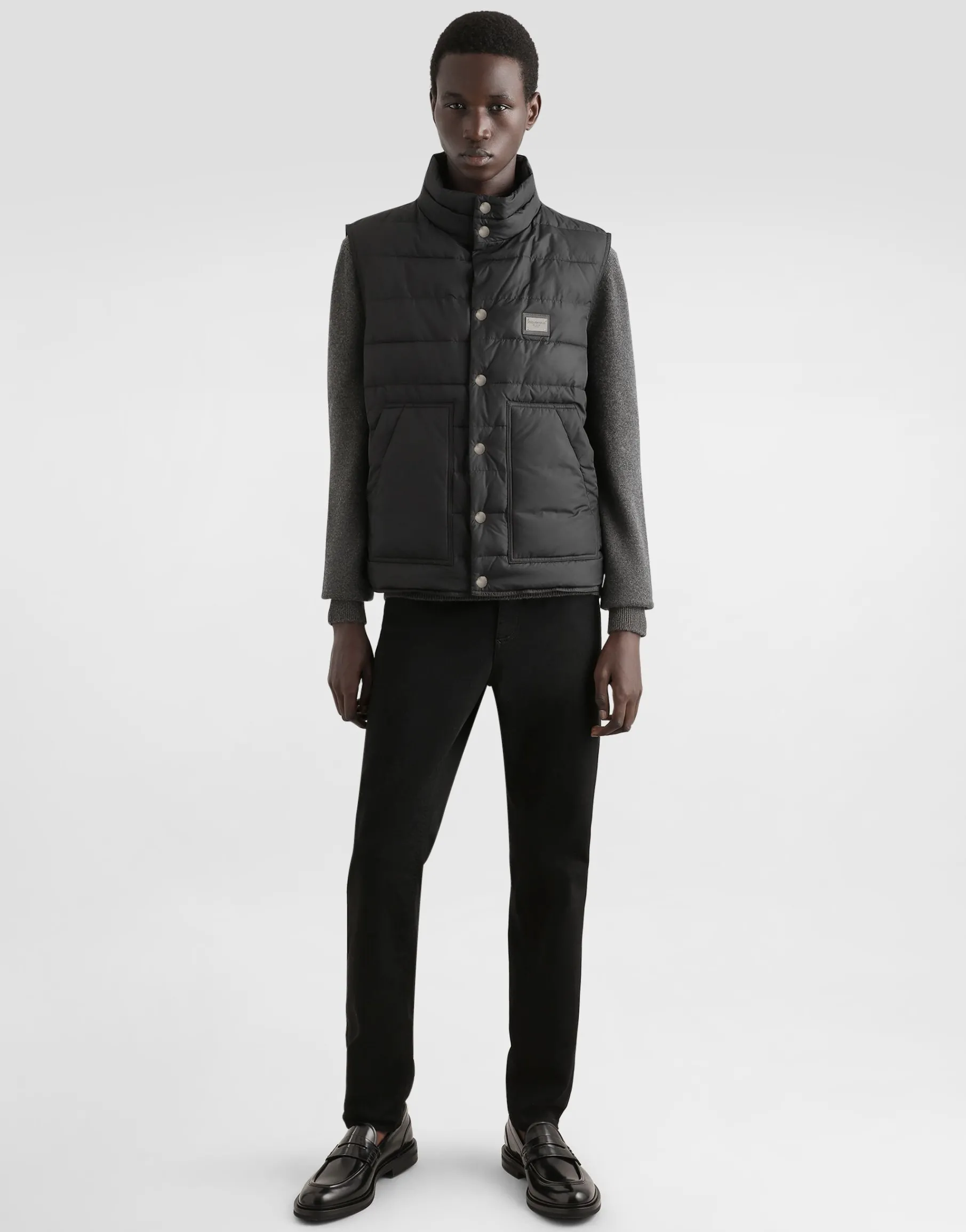 Wool round-neck sweater with branded tag