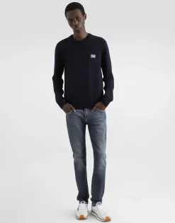 Wool round-neck sweater with branded tag