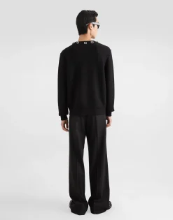 Wool round-neck sweater with embroidery and bejeweled buttons