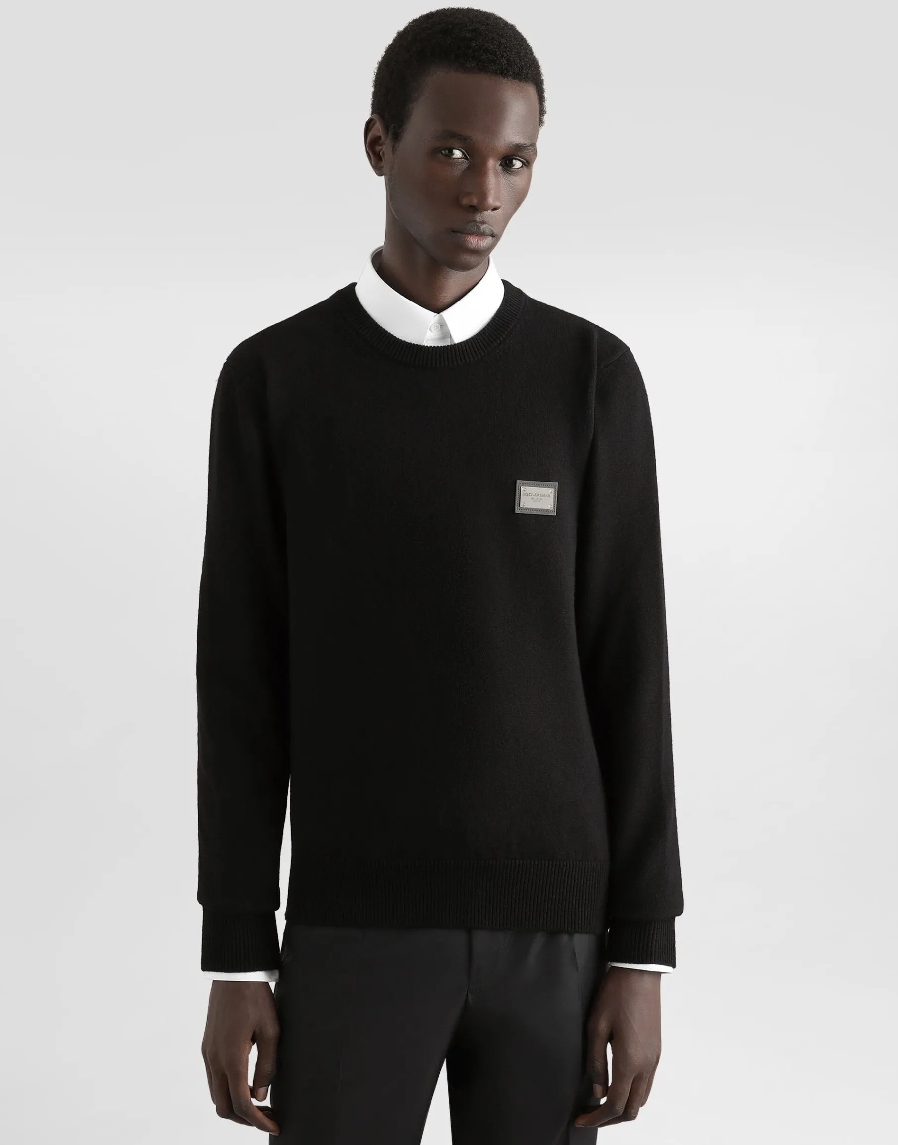 Wool round-neck sweater with branded tag