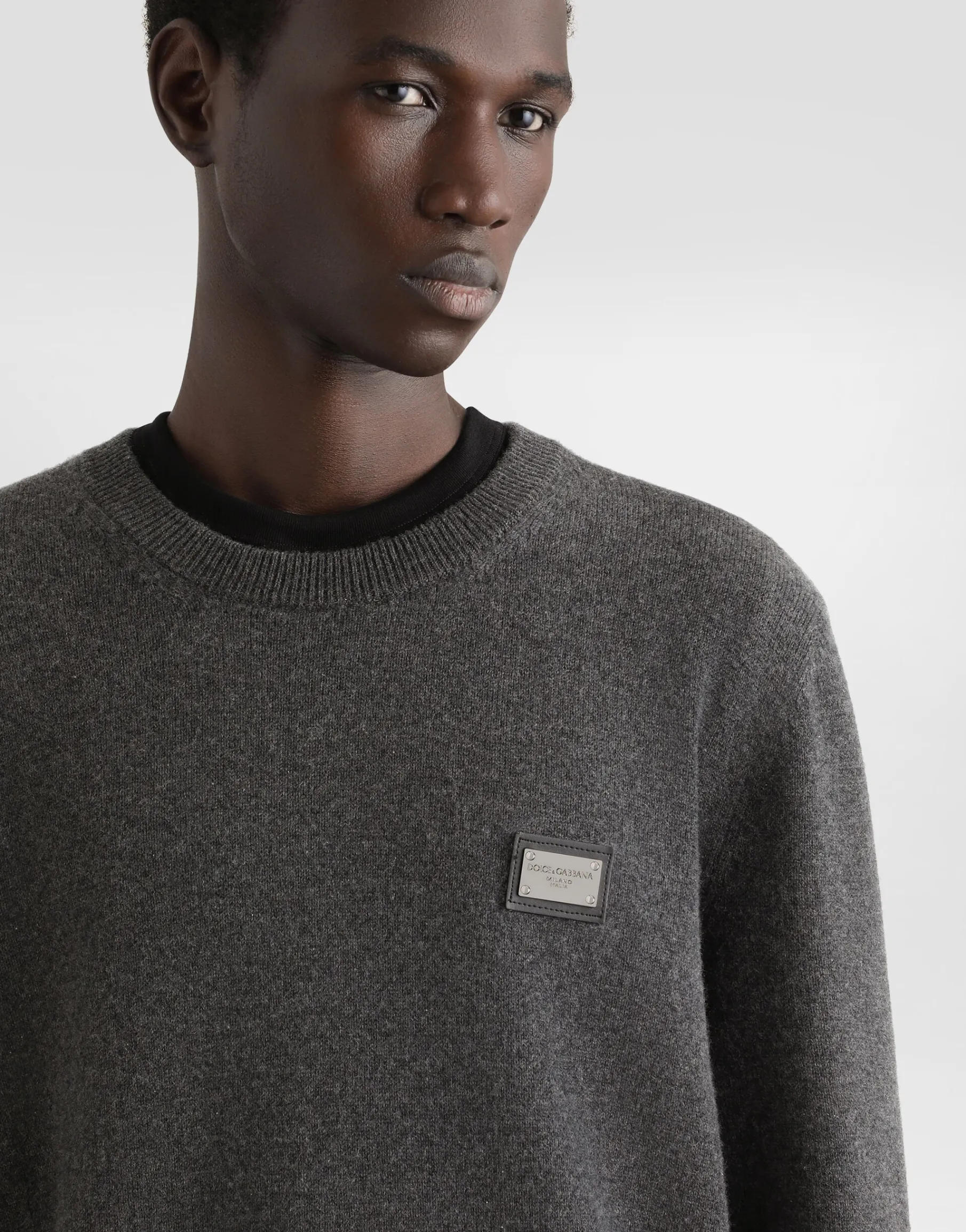 Wool round-neck sweater with branded tag