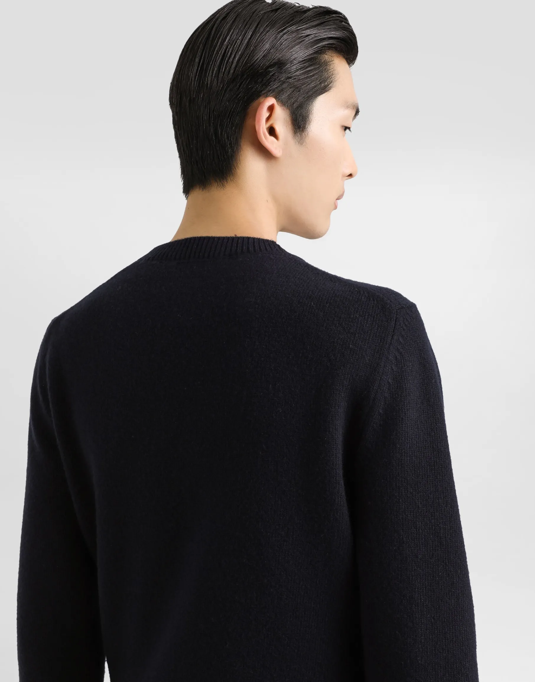 Wool round-neck sweater with bejeweled buttons