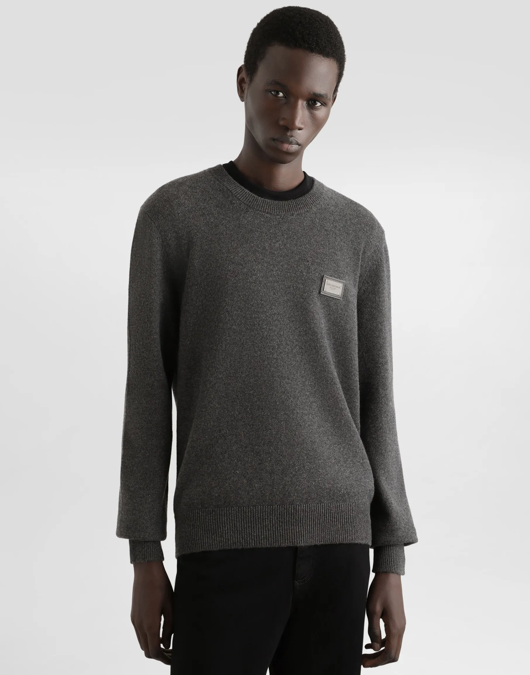 Wool round-neck sweater with branded tag