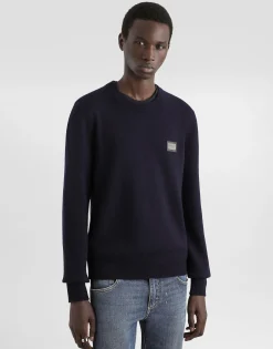 Wool round-neck sweater with branded tag