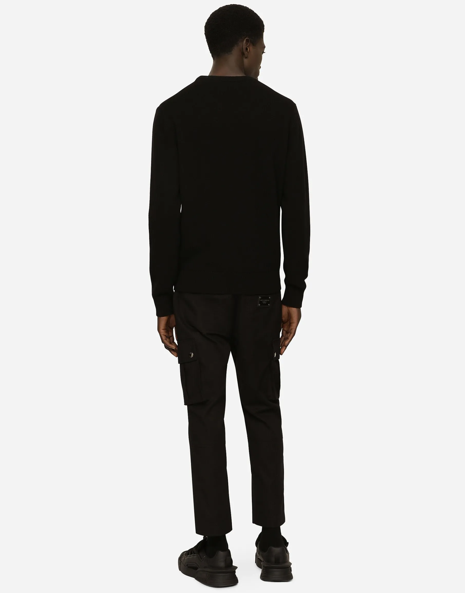 Wool round-neck sweater with branded tag