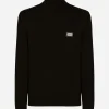 Wool turtle-neck sweater with branded tag
