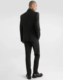 Wool turtle-neck sweater with branded tag