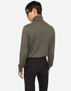 Wool turtle-neck sweater with branded tag