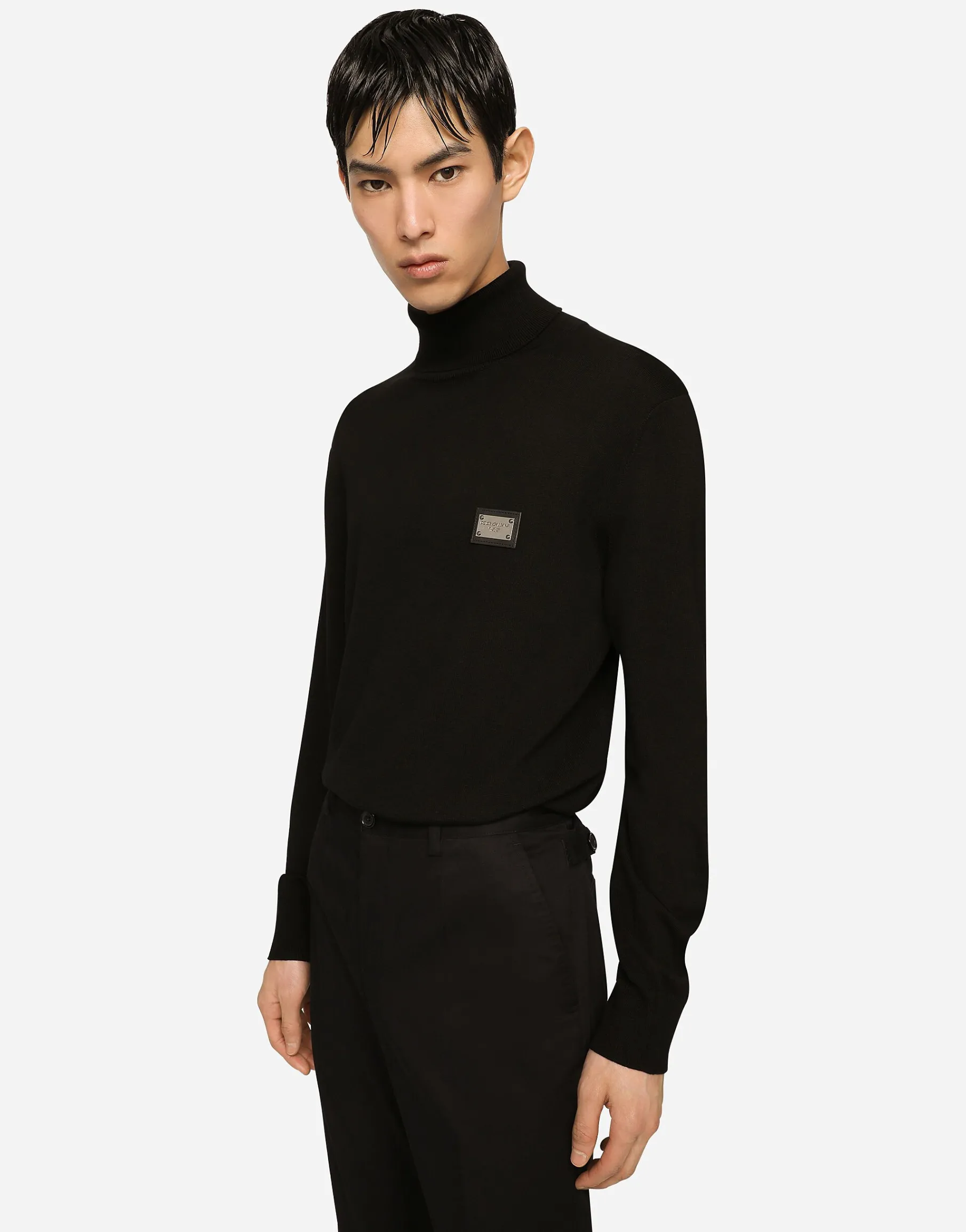 Wool turtle-neck sweater with branded tag