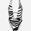 Zebra-print one-piece swimsuit with plunging neckline
